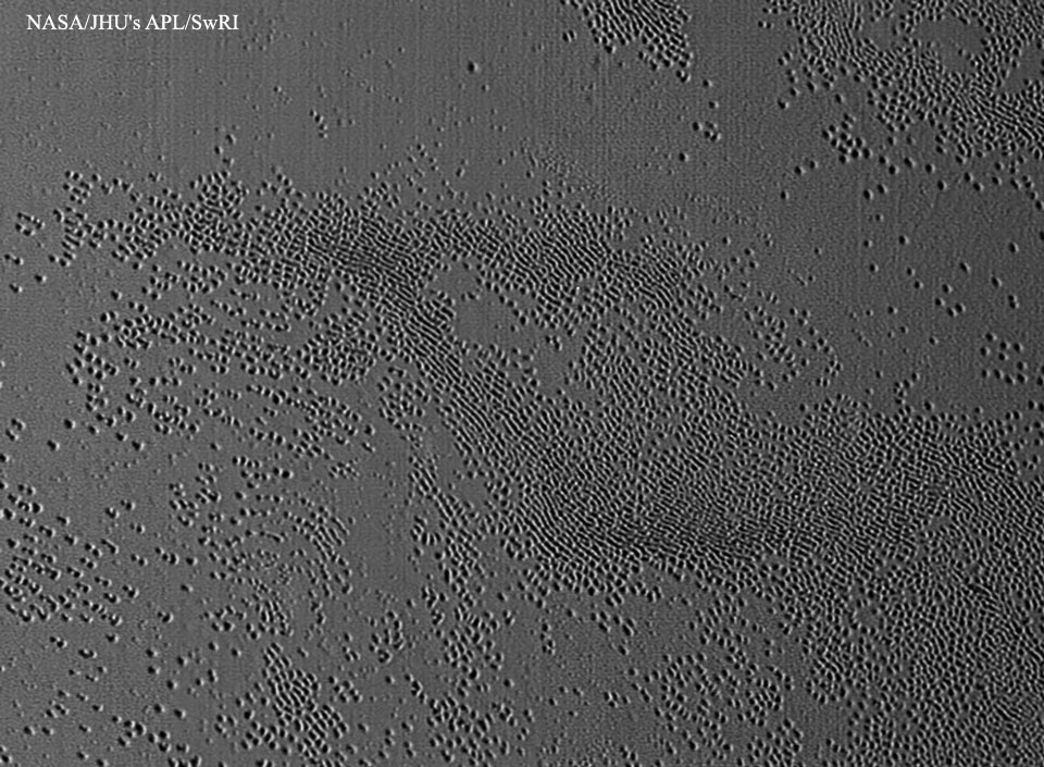 PlutoPits_NewHorizons_960.jpg